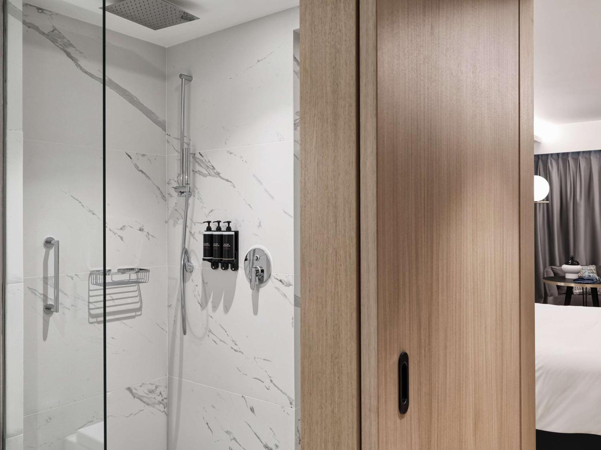 Grand Hyatt Athens Hotel Exterior photo A shower with a rain shower head